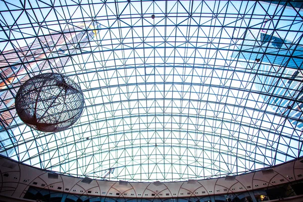 Transparent roof of shopping center AfiMall City and Mercury city Tower