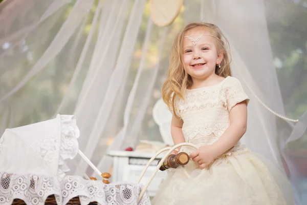 Outdoor portrait of cute little girl in princess dress