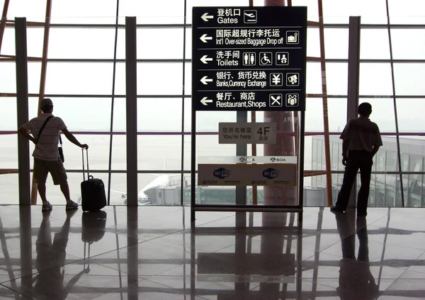 BEIJING - SEP 15: Undefined passenger are standing in Beijing International Airport on September 15, 2010. Beijing International is one of the Biggest hubs on asia, china
