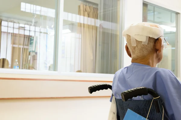 Patients with head injury on wheelchair