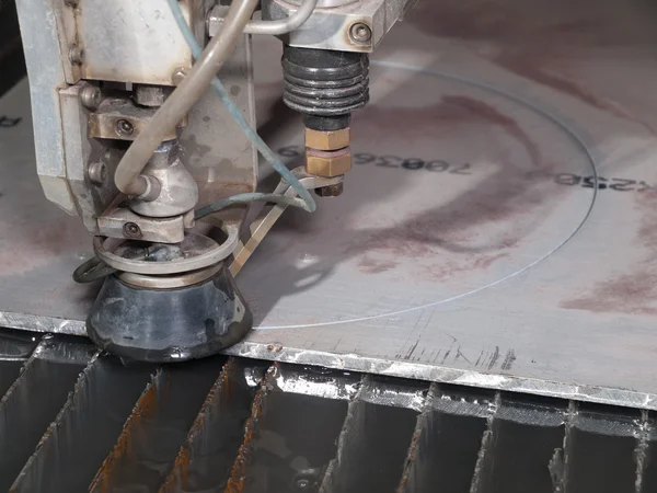 Water pressure cutting through stainless steel materials
